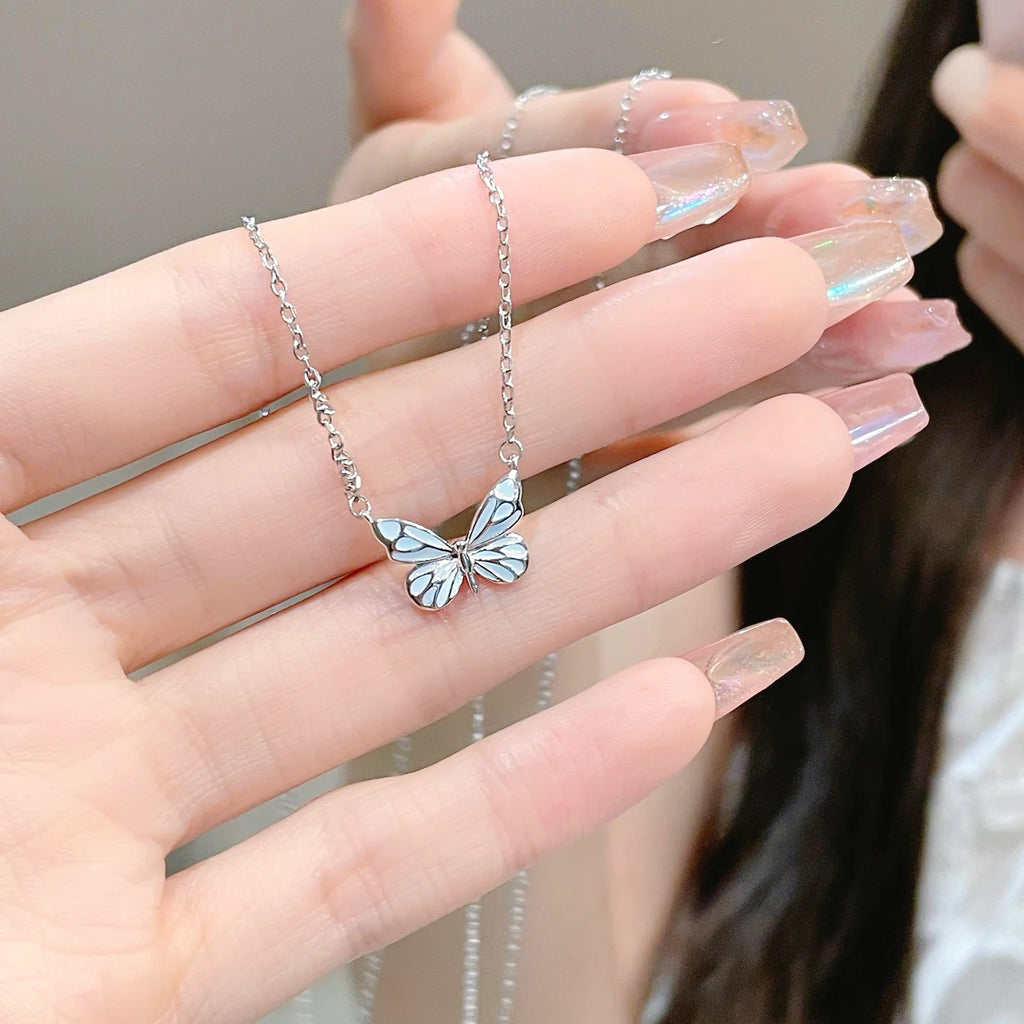 Luminous Aura Blue Butterfly Necklace
